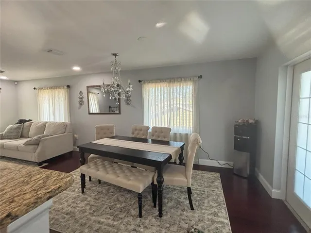 a view of a livingroom with furniture and window
