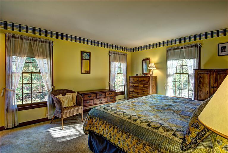 80 Sea Robin Road Osterville, MA 02655 - Photo 12 of 20 a bedroom with a bed window and a dresser
