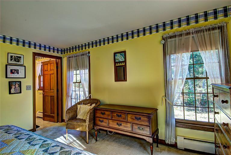 80 Sea Robin Road Osterville, MA 02655 - Photo 14 of 20 a bedroom with a bed and a window