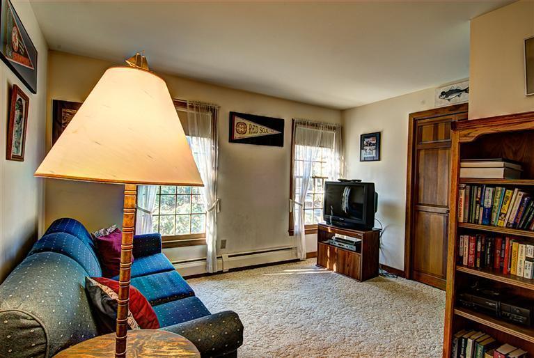 80 Sea Robin Road Osterville, MA 02655 - Photo 16 of 20 a living room with furniture and a flat screen tv