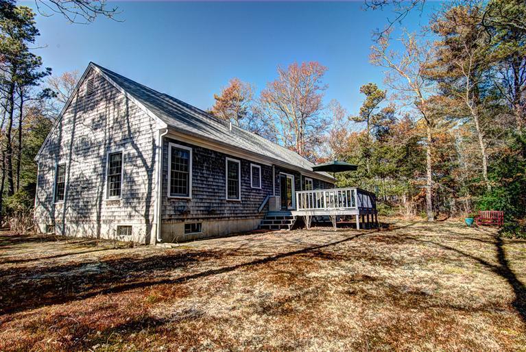 80 Sea Robin Road Osterville, MA 02655 - Photo 19 of 20 a house with a large tree in front of it