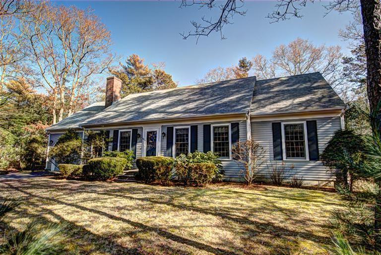 80 Sea Robin Road Osterville, MA 02655 - Photo 2 of 20 a front view of house with yard seating and green space