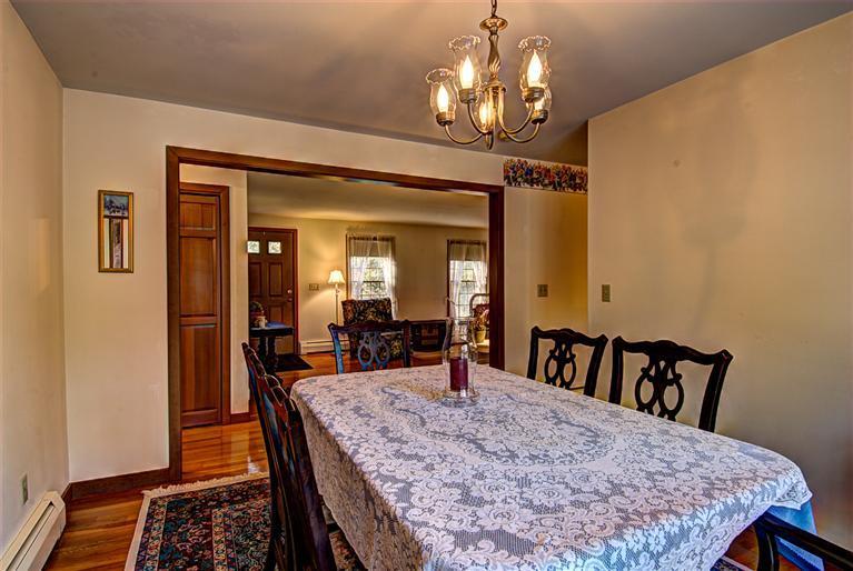 80 Sea Robin Road Osterville, MA 02655 - Photo 9 of 20 a view of a dining room with furniture