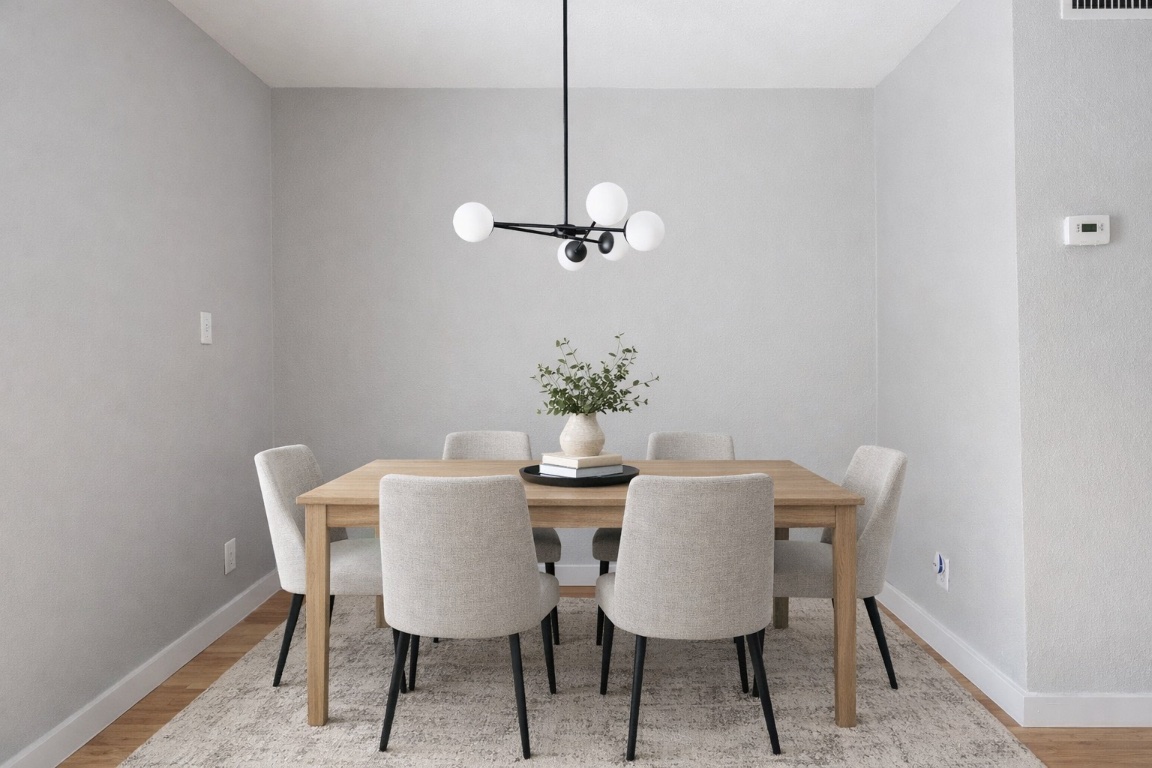 3601 Menchaca Road, Unit 117 Austin, TX 78704 - Photo 12 of 29 a dining room with furniture and a chandelier