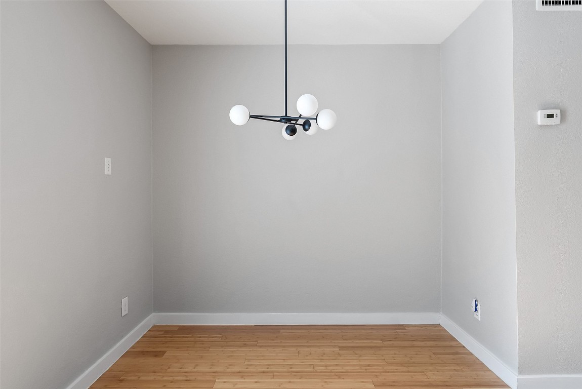 3601 Menchaca Road, Unit 117 Austin, TX 78704 - Photo 13 of 29 a view of a room with wooden floor