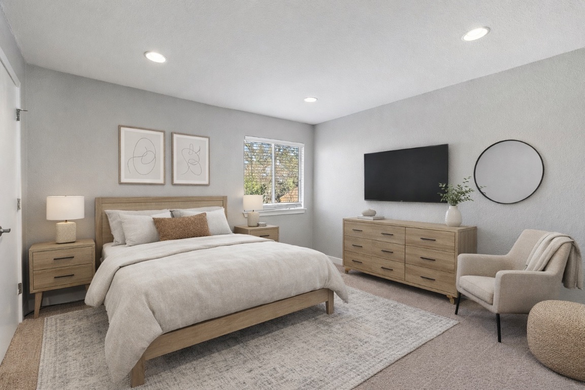 3601 Menchaca Road, Unit 117 Austin, TX 78704 - Photo 17 of 29 a bedroom with bed and a flat screen tv