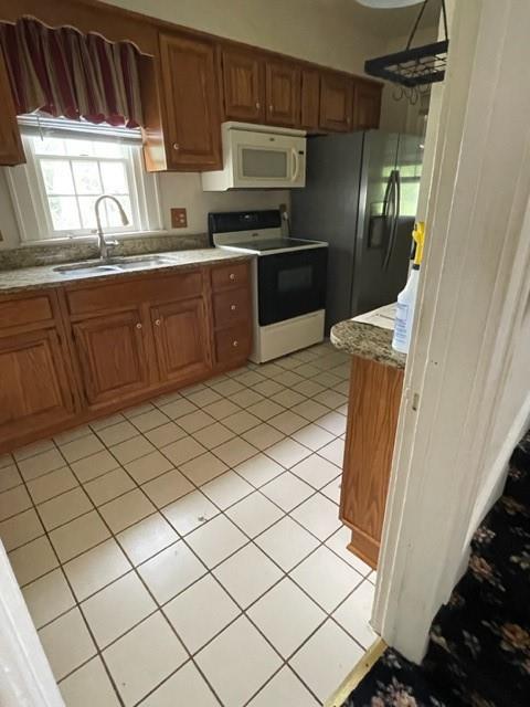 1955 Ridge Rd Extension Ambridge, PA 15003 - Photo 12 of 27 a kitchen with stainless steel appliances granite countertop a refrigerator and a sink