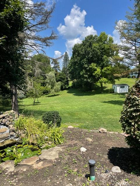 1955 Ridge Rd Extension Ambridge, PA 15003 - Photo 27 of 27 a view of a garden with a fountain