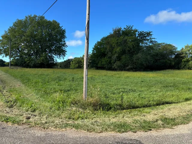 a view of an outdoor space and a yard