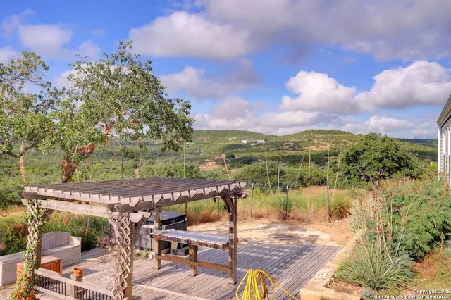 a view of a terrace with sitting area