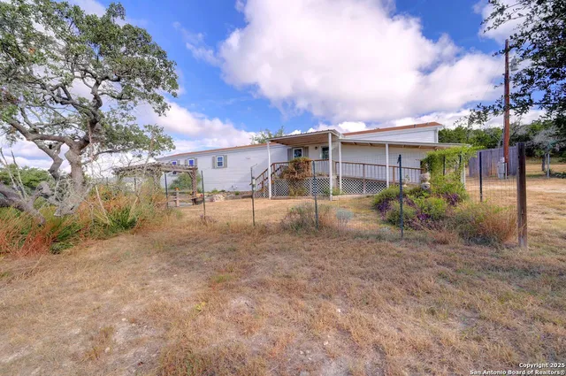 a view of a yard in front of a house