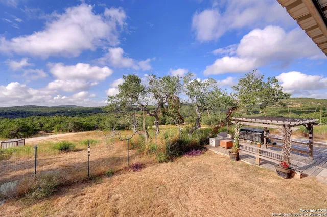 a view of a terrace with a yard