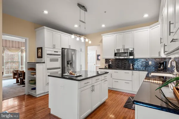 a view of a hallway with windows