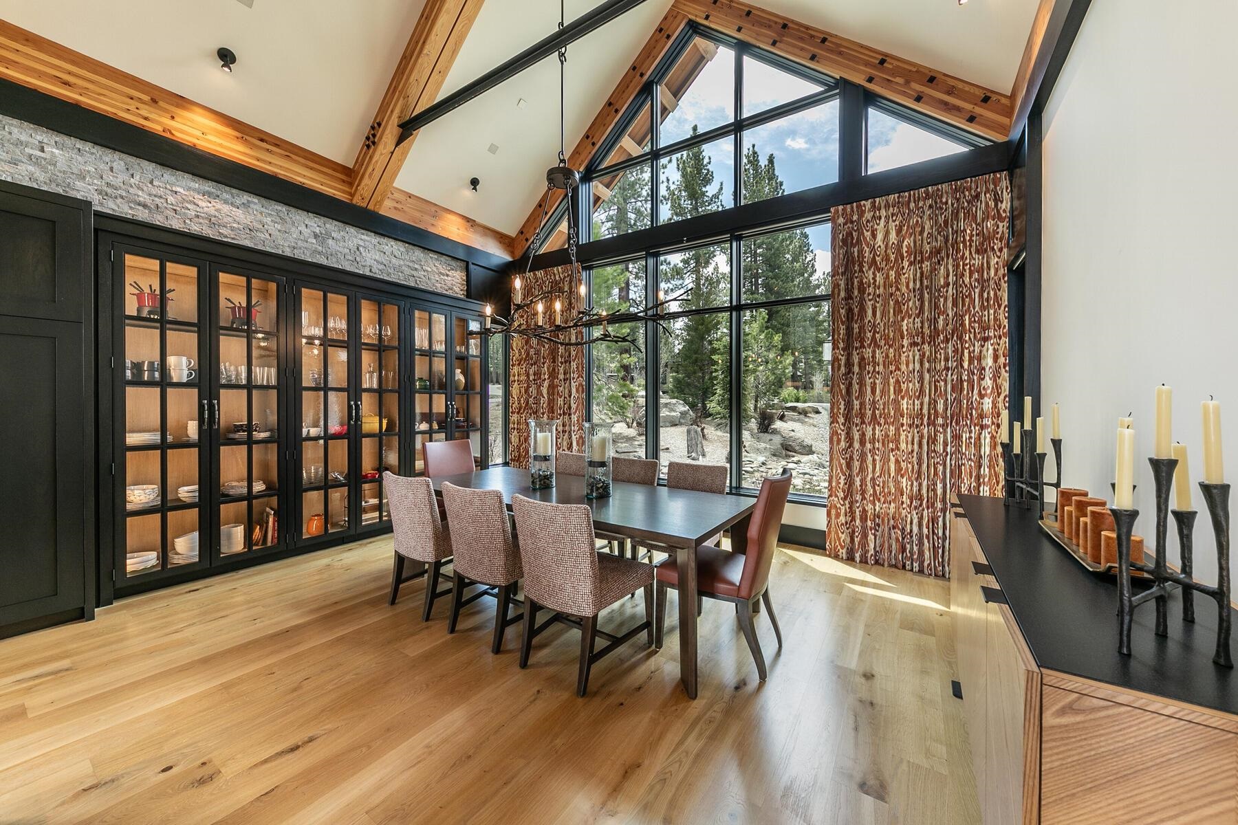 11454 Henness Road Truckee, CA 96161 - Photo 7 of 27 a view of a dining room with furniture window and wooden floor