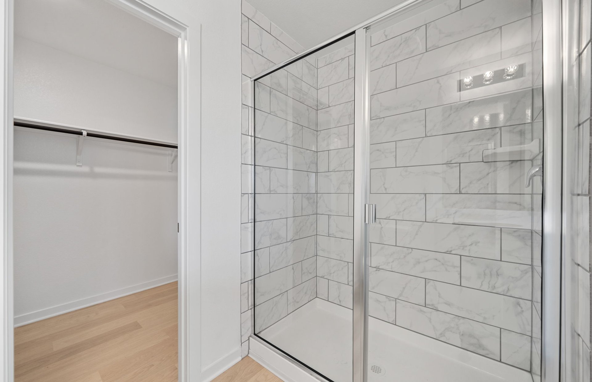 608 Rubber Tree Way Buda, TX 78610 - Photo 15 of 29 a bathroom with a shower