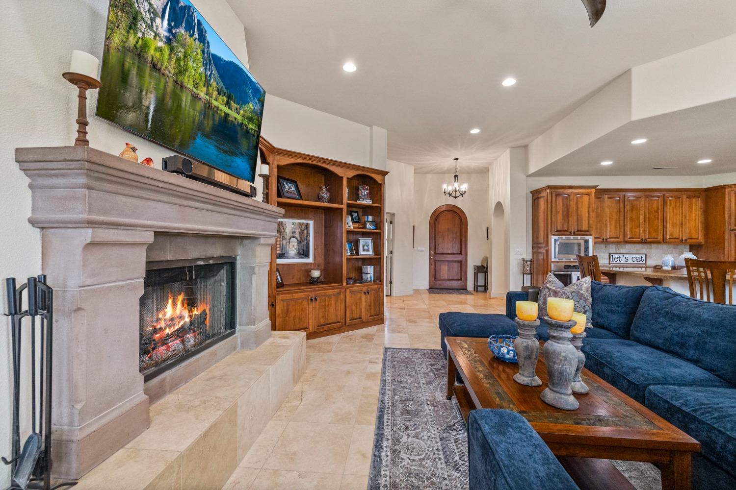 16 Flagstone Court Copperopolis, CA 95228 - Photo 16 of 45 a living room with furniture and a fireplace