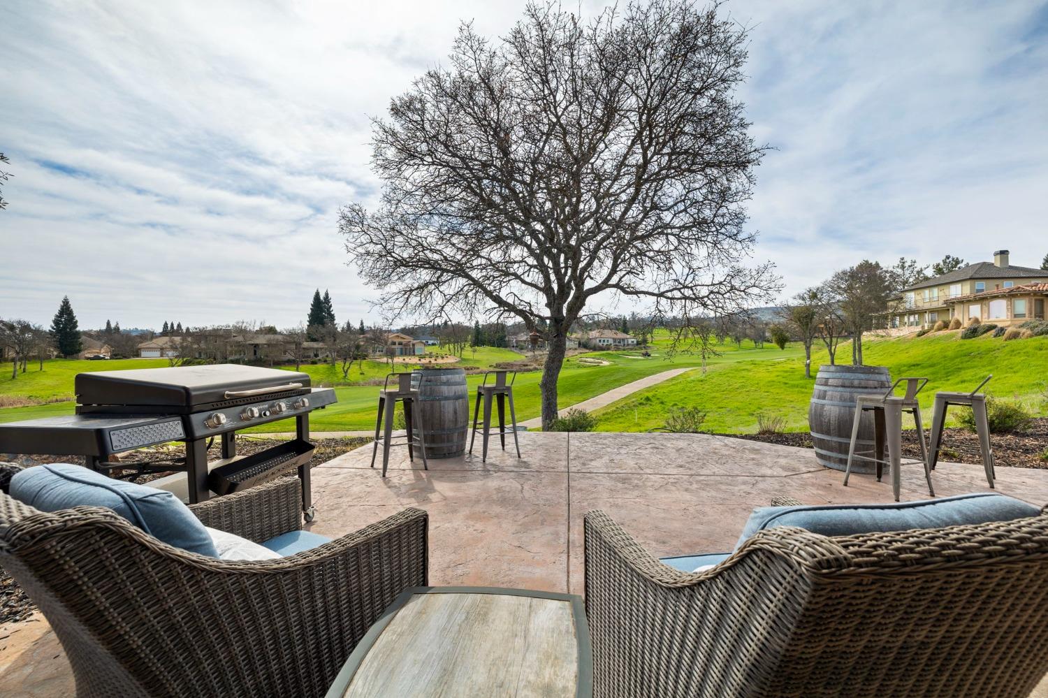 16 Flagstone Court Copperopolis, CA 95228 - Photo 20 of 45 an outdoor sitting area with furniture and garden