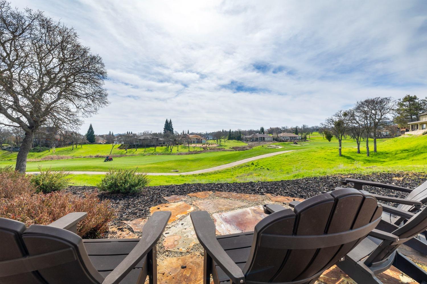 16 Flagstone Court Copperopolis, CA 95228 - Photo 22 of 45 a view of a swimming pool and a yard