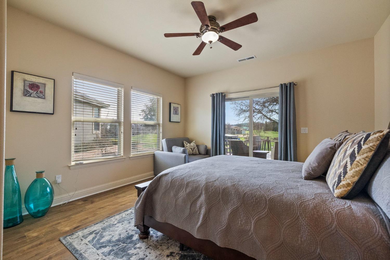 16 Flagstone Court Copperopolis, CA 95228 - Photo 27 of 45 a bed sitting in a bedroom next to a window