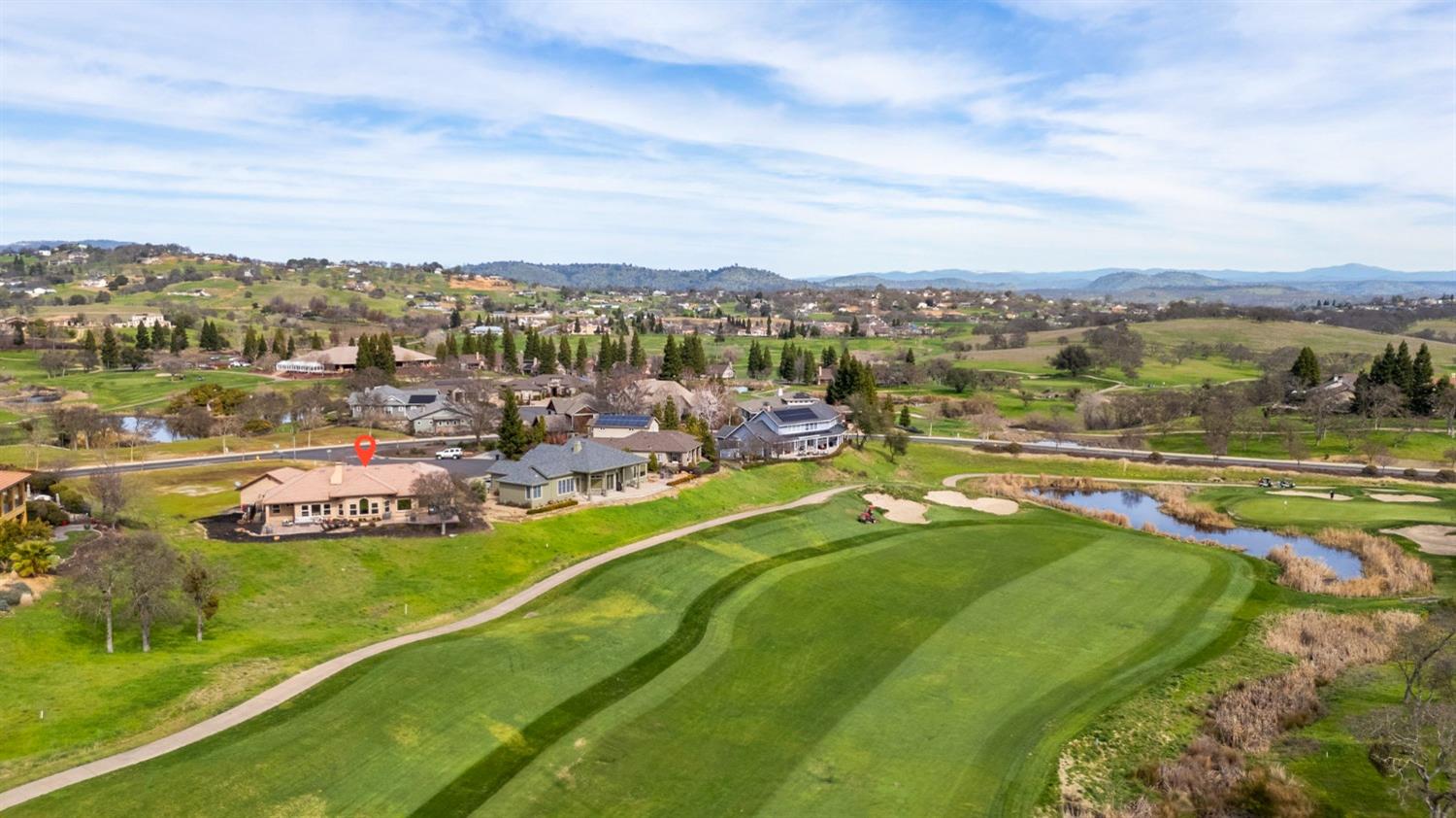 16 Flagstone Court Copperopolis, CA 95228 - Photo 37 of 45 a view of a lake with a city