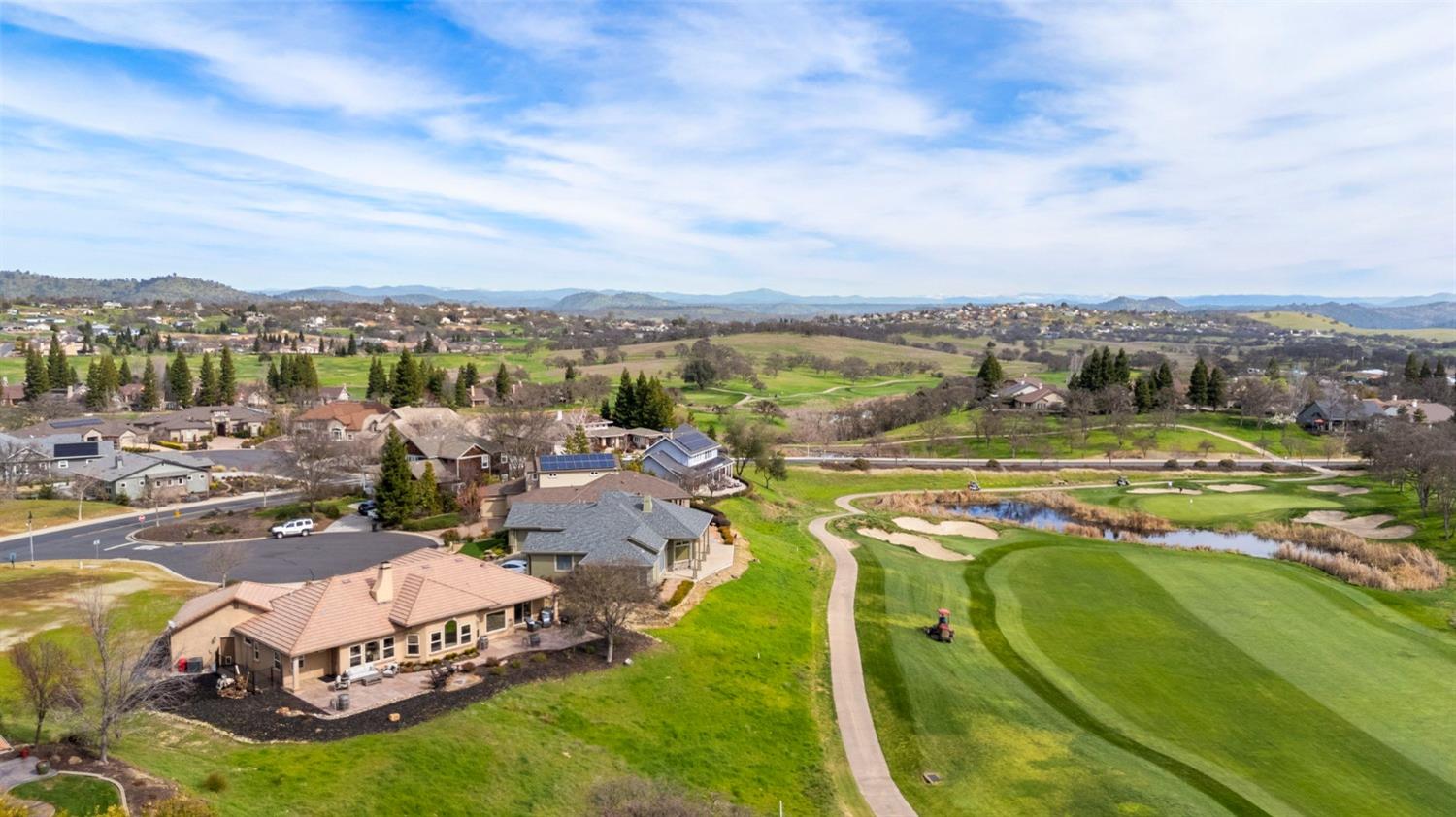 16 Flagstone Court Copperopolis, CA 95228 - Photo 38 of 45 a view of a swimming pool with a lake view