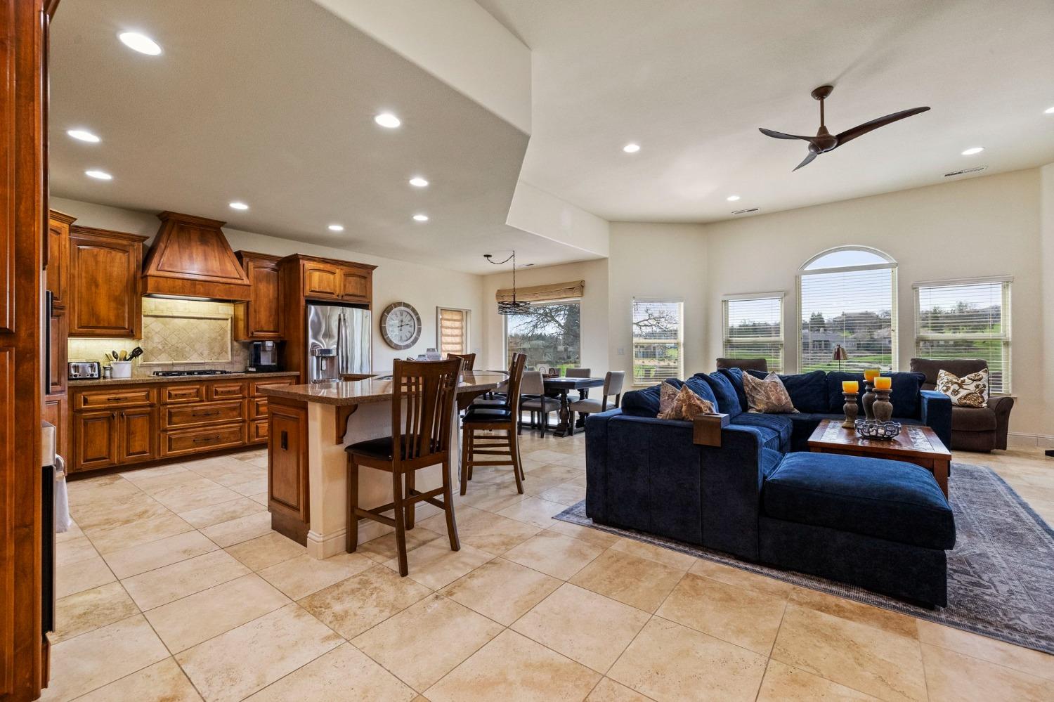 16 Flagstone Court Copperopolis, CA 95228 - Photo 45 of 45 a living room with furniture and a dining table with kitchen view