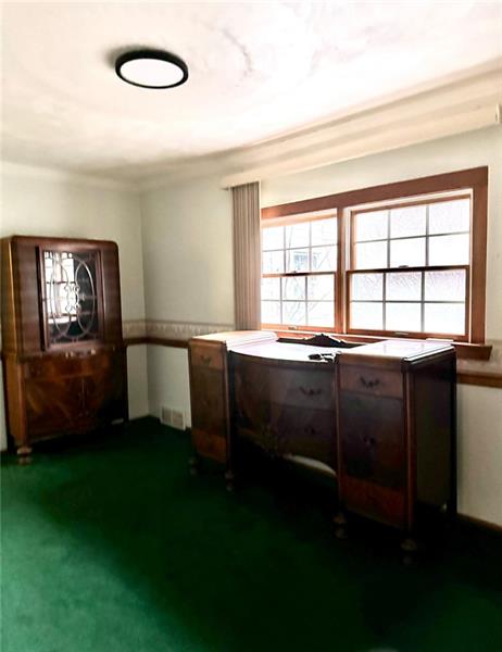 616 Sandy Hill Road Irwin, PA 15642 - Photo 14 of 38 a living room with a bed furniture and a large window
