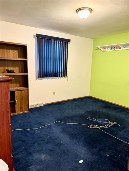 616 Sandy Hill Road Irwin, PA 15642 - Photo 23 of 38 a view of an empty room with wooden floor
