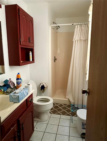 616 Sandy Hill Road Irwin, PA 15642 - Photo 24 of 38 a bathroom with a sink toilet and shower