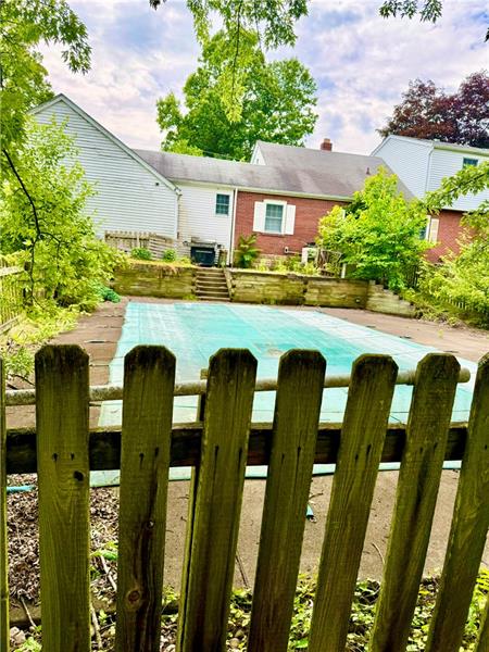 616 Sandy Hill Road Irwin, PA 15642 - Photo 28 of 38 a view of swimming pool with outdoor seating and plants