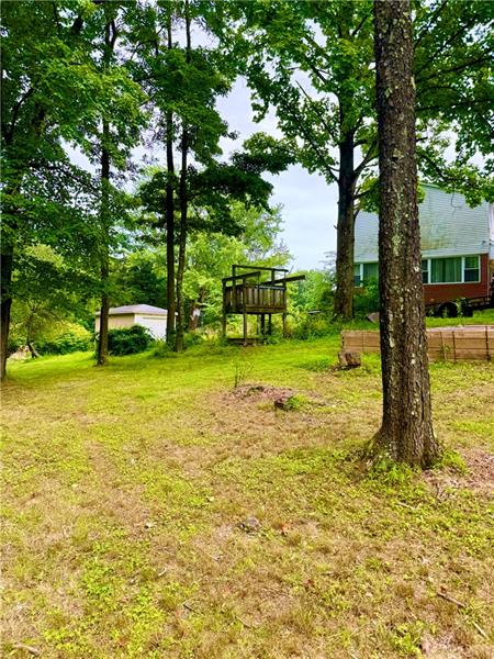 616 Sandy Hill Road Irwin, PA 15642 - Photo 31 of 38 a view of a trees with a yard
