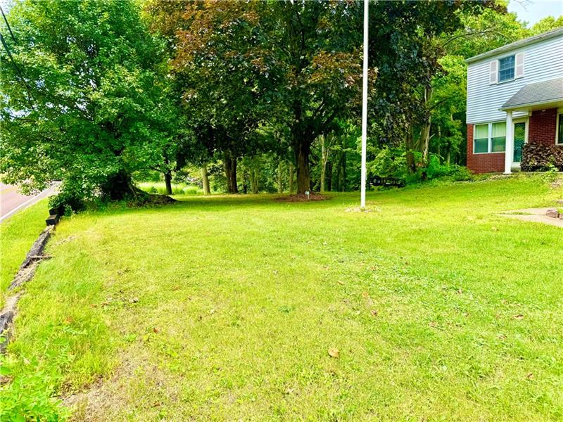 616 Sandy Hill Road Irwin, PA 15642 - Photo 5 of 38 a view of a yard with a house
