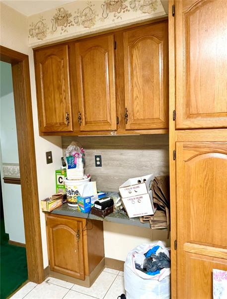 616 Sandy Hill Road Irwin, PA 15642 - Photo 10 of 38 a kitchen with stainless steel appliances granite countertop a refrigerator and a stove