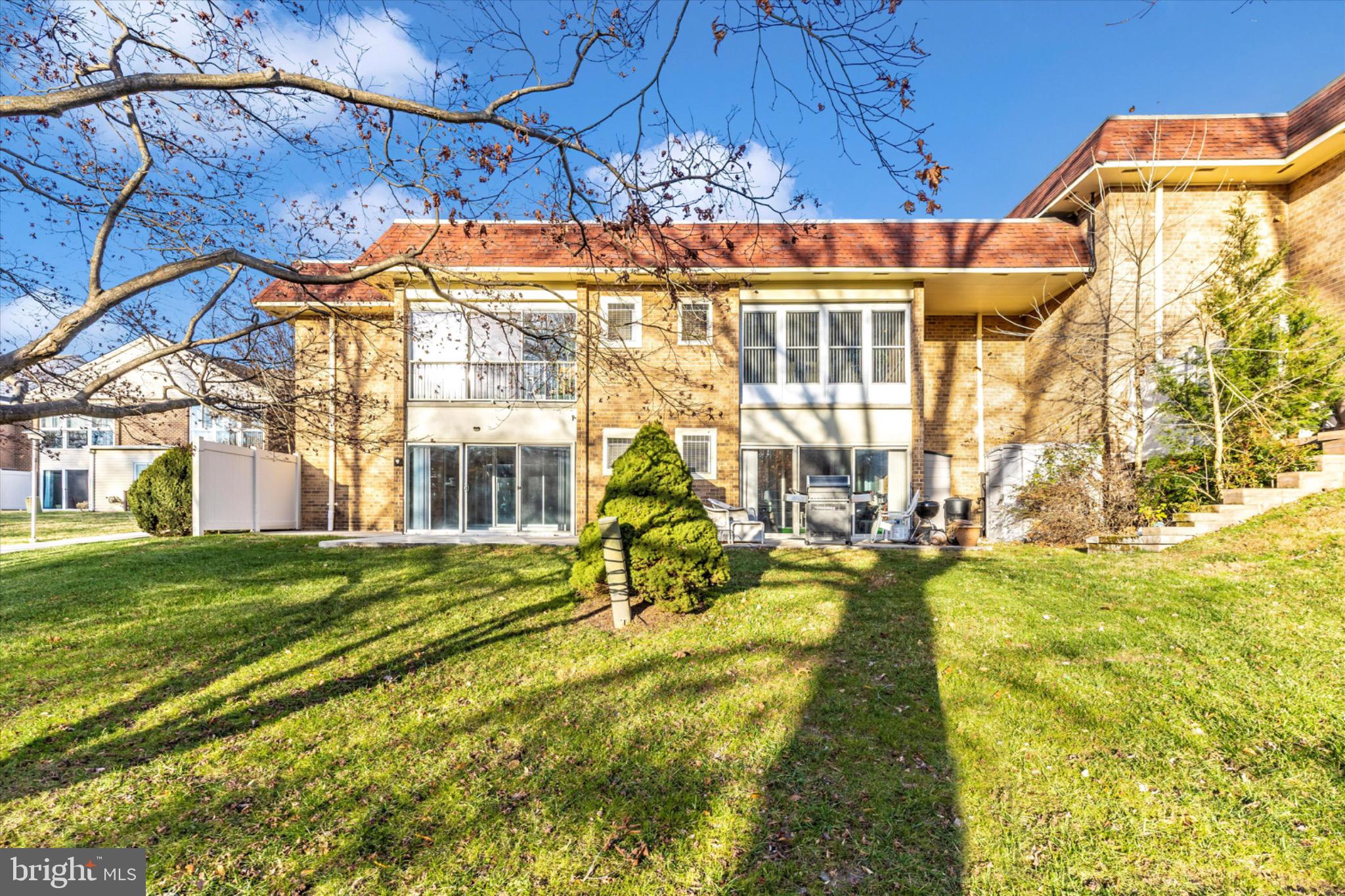 3215 South Leisure World Boulevard, Unit 1011 Silver Spring, MD 20906 - Photo 15 of 27 a view of an house with swimming pool