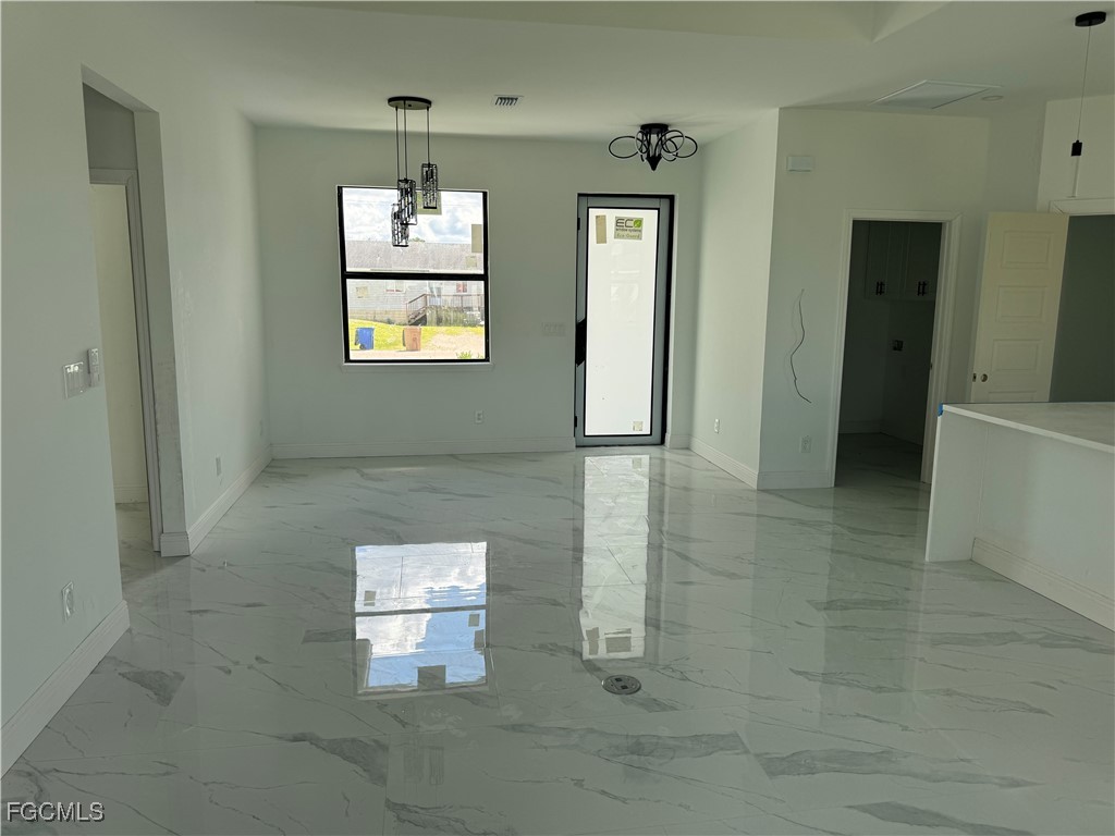 4906 Brookfield Street Lehigh Acres, FL 33971 - Photo 3 of 5 a room with window