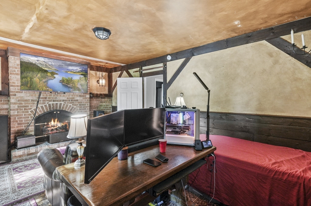 69 Appleton Road Auburn, MA 01501 - Photo 16 of 42 a living room with furniture and a flat screen tv