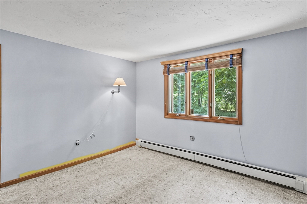 69 Appleton Road Auburn, MA 01501 - Photo 22 of 42 a view of an empty room with a window