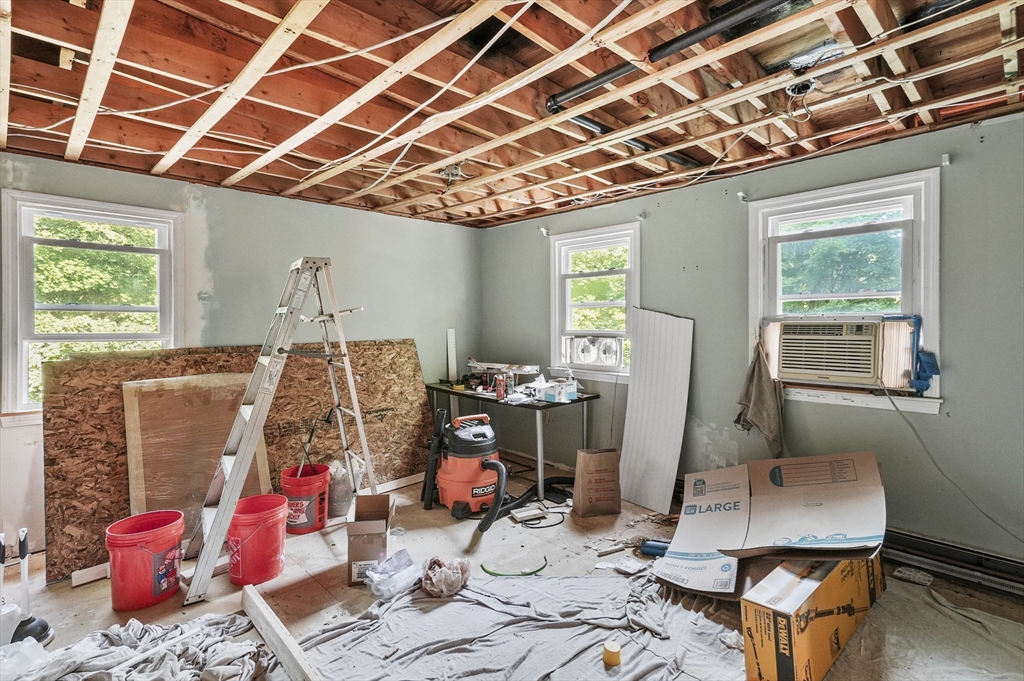 69 Appleton Road Auburn, MA 01501 - Photo 28 of 42 a room with furniture and gym equipment