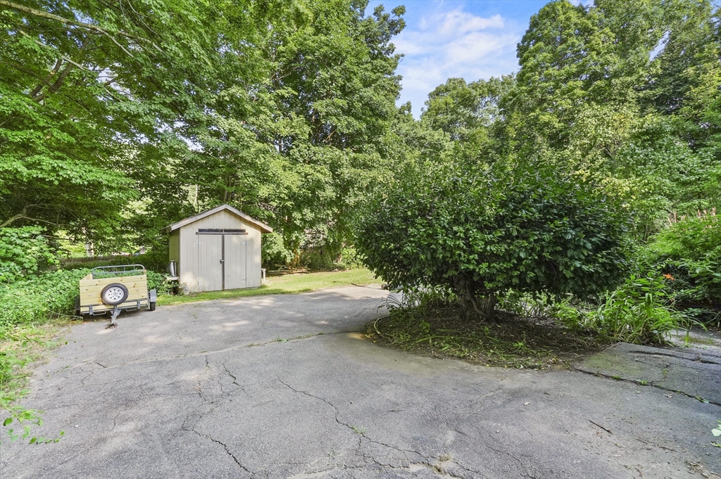 69 Appleton Road Auburn, MA 01501 - Photo 31 of 42 a view of a house with a yard and large tree