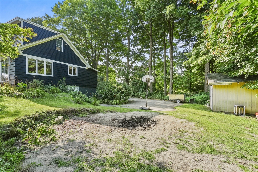 69 Appleton Road Auburn, MA 01501 - Photo 39 of 42 a house view with a garden space