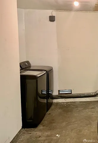 a view of a hallway with windows