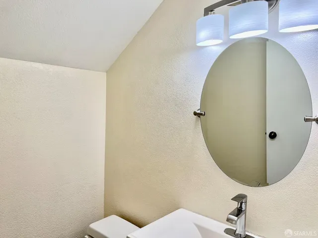 a view of a balcony with wooden floor