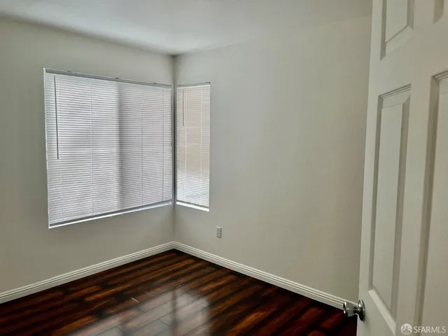 view of small space with wooden floor