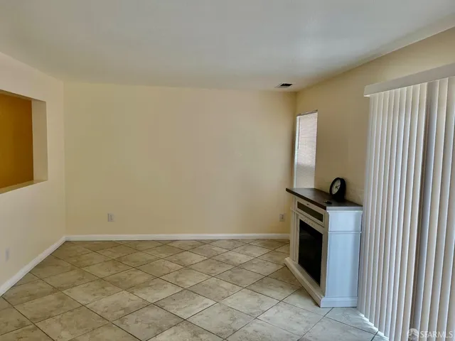 a kitchen with stainless steel appliances granite countertop a refrigerator sink and stove