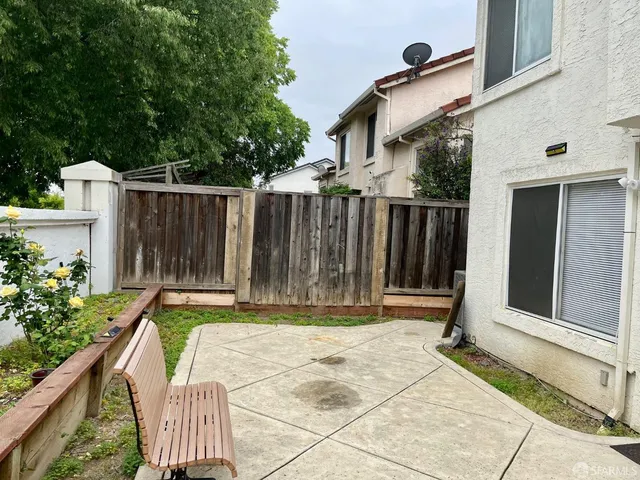 a view of house with patio outdoor seating