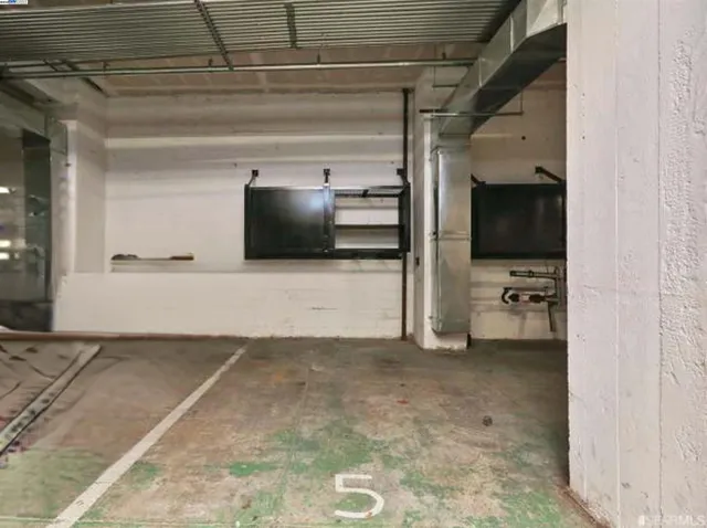 a view of a livingroom with a furniture