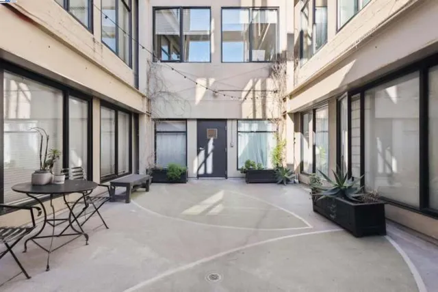 a front view of a building with many windows