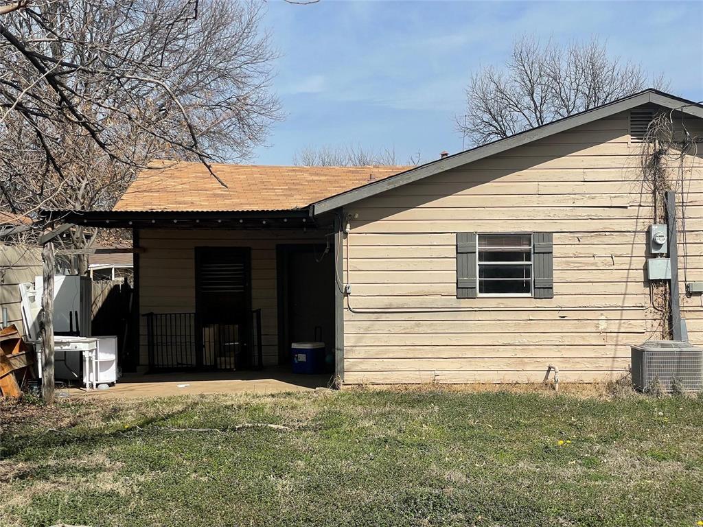 1442 Ave B Graham, TX 76450 - Photo 10 of 10 a view of a house with a yard
