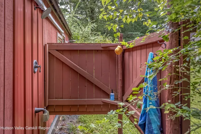 a view of a hallway with paintings on the wall
