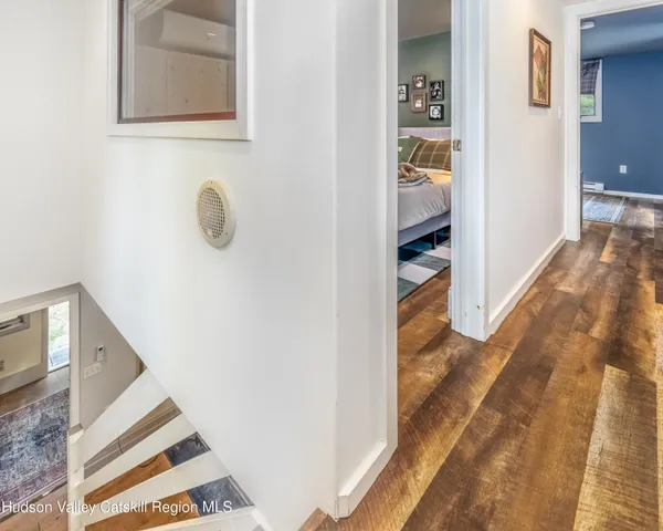 a view of a garden with large tree